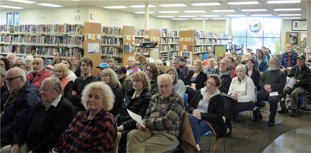 A Library program held in the library “living room” to accommodate more attendees.