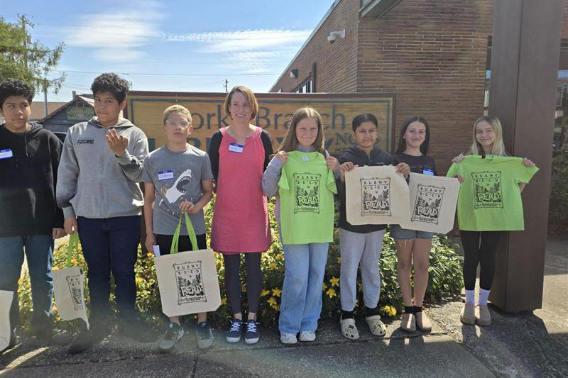 Nellie with young writers at the “Starting from Seeds” workshop, Forks Library.