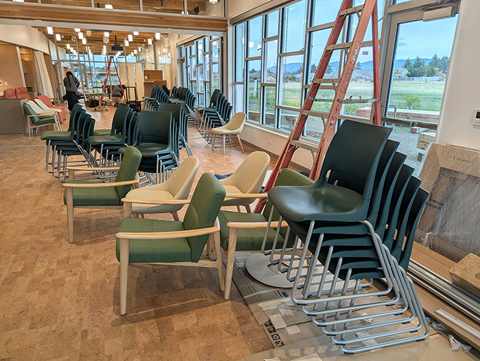 New furniture is unpacked and assembled in the Sequim Library’s meeting room.