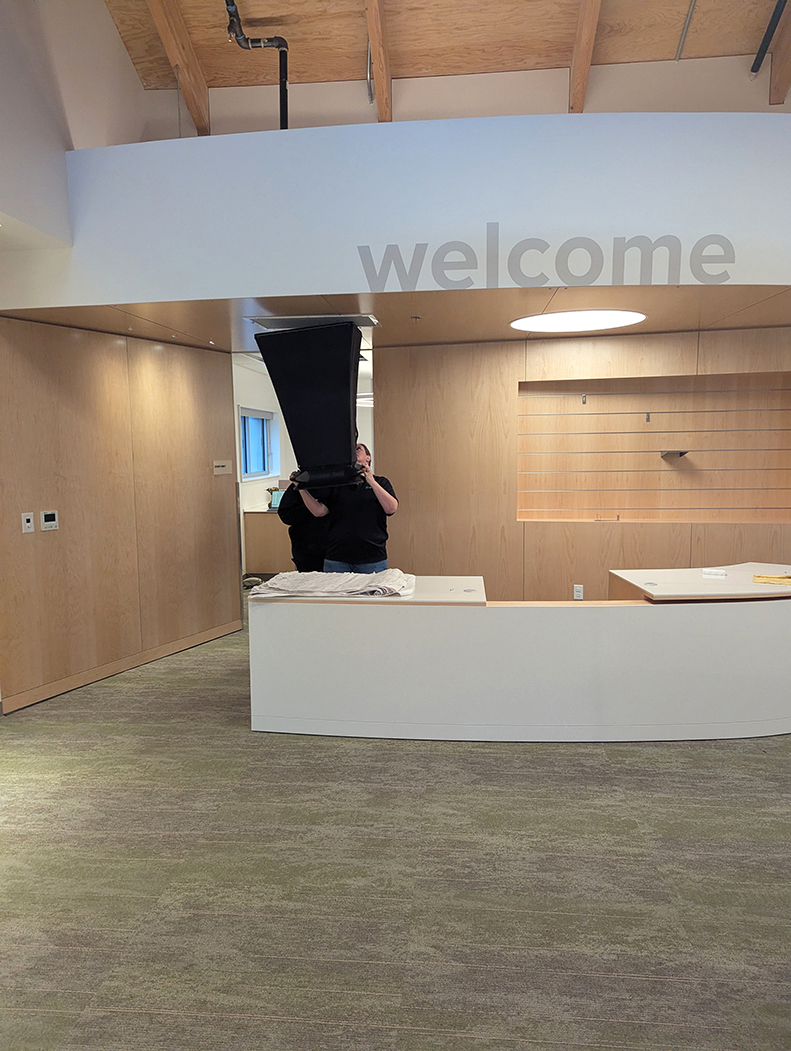 Contractors test and adjust the building’s new heating, cooling, and ventilation systems.